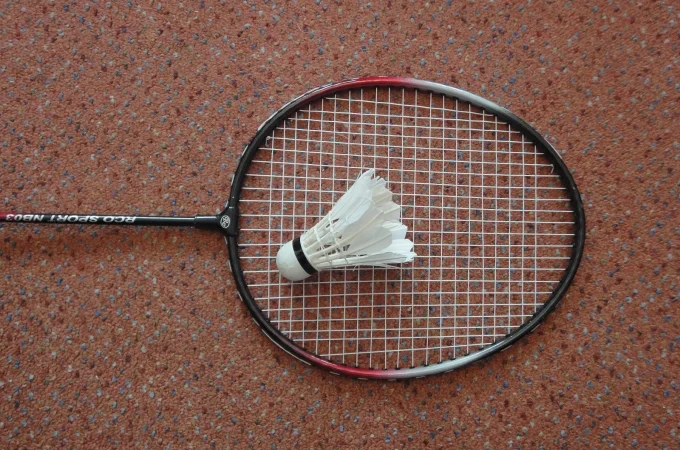 A badminton racket and shuttlecock