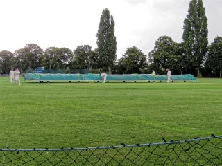 Mobile covers protecting a cricket pitch at Sandwich Town Cricket Club