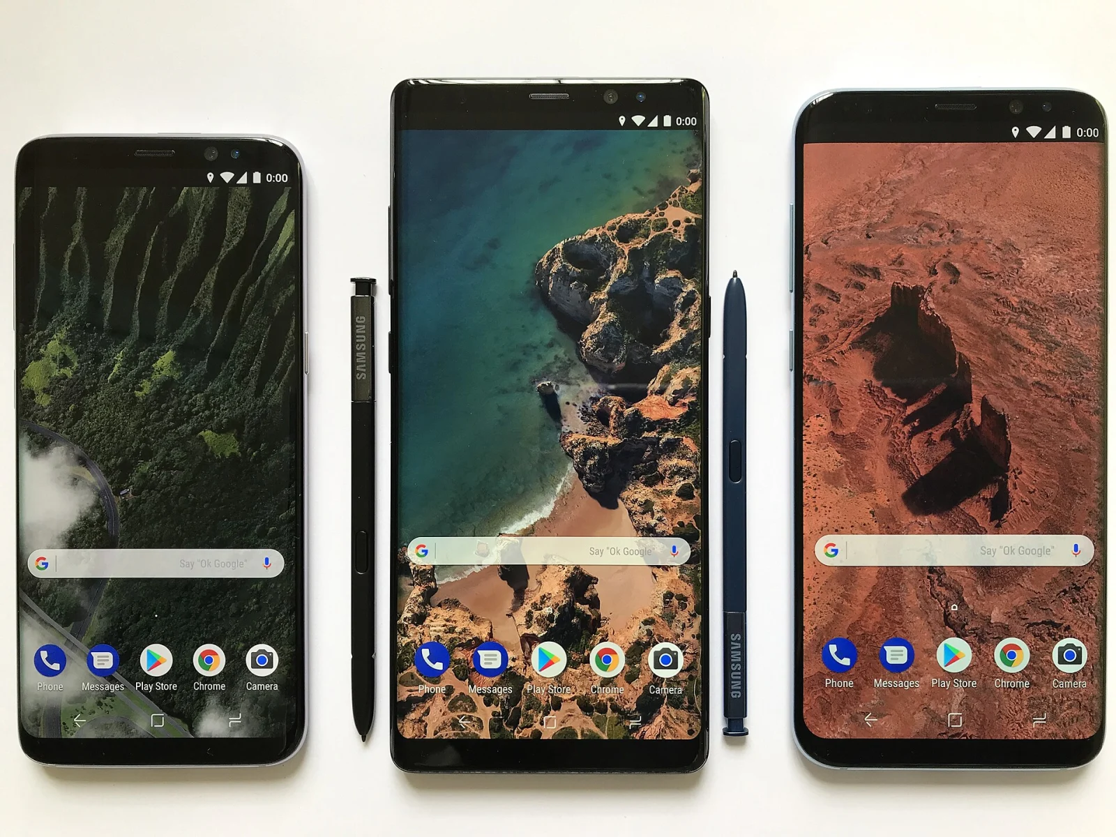 Two Android smartphones displaying their home screens