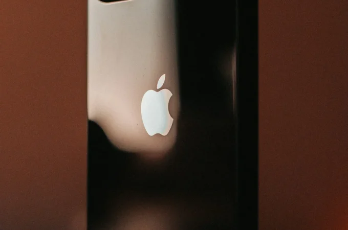 An Apple iPhone resting on a table