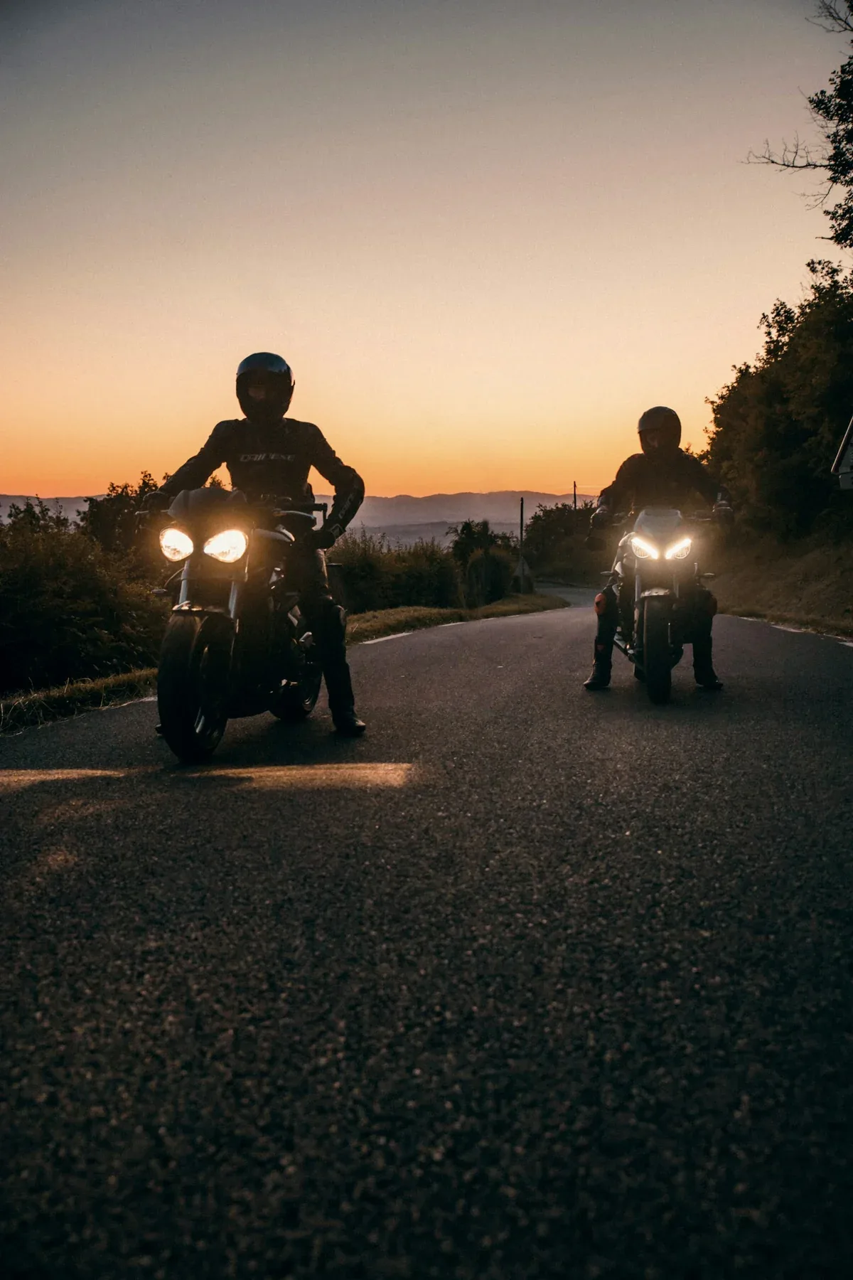 Motorcyclists riding on an open road